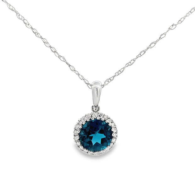 14 Karat White Gold Blue Topaz Pendant